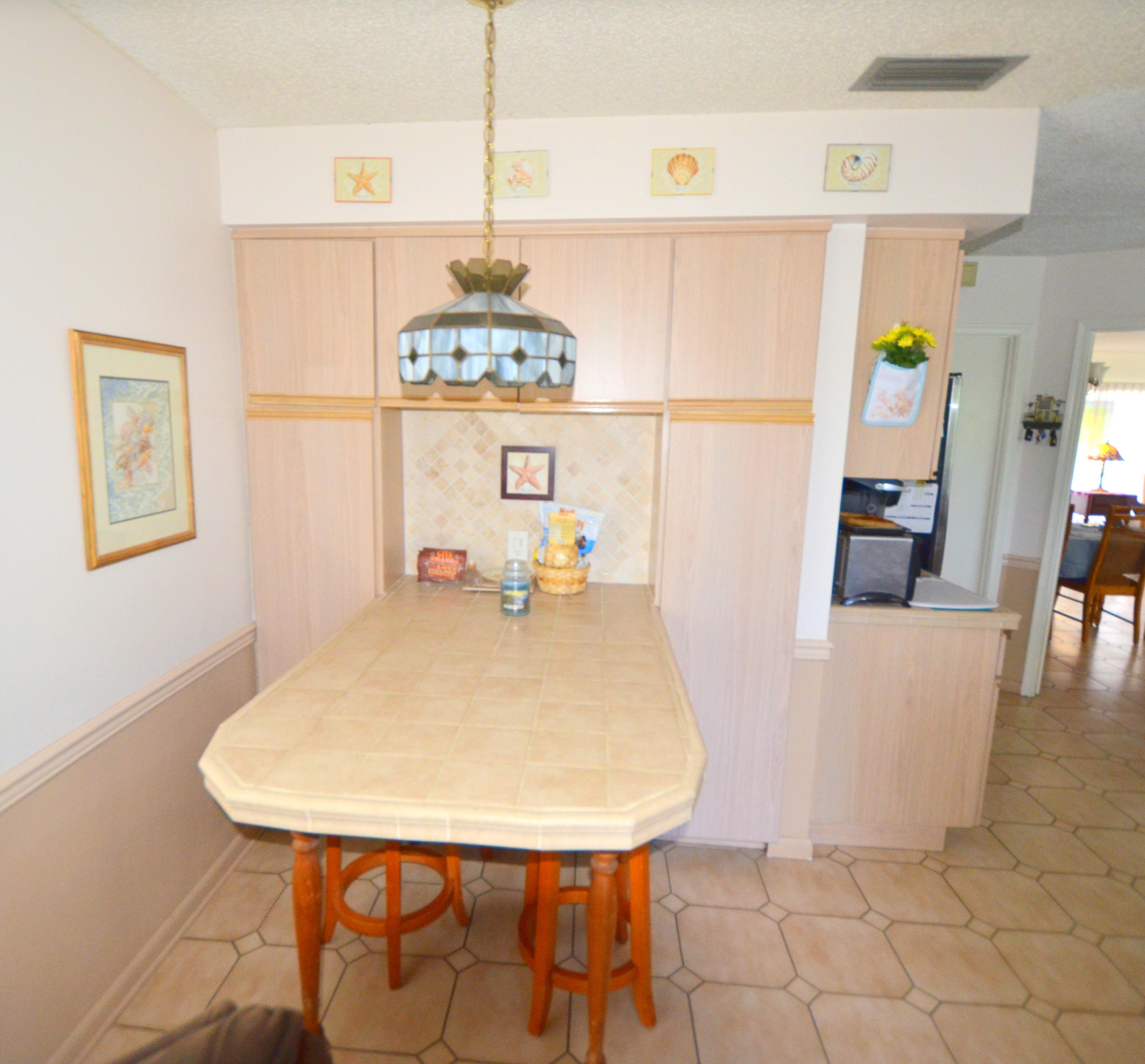 10695 Eland Street Boca Raton, FL 33428 - Photo 19 of 25 Pantry and Eating Area
