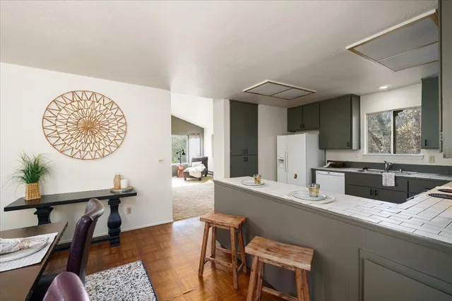 a bedroom with a bed and a chair