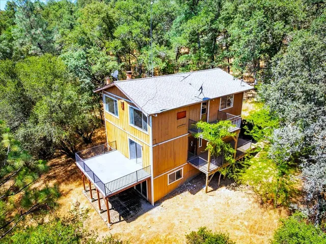 a house with trees in front of it