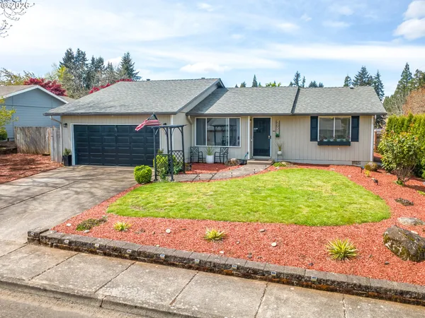 front view of a house with a yard