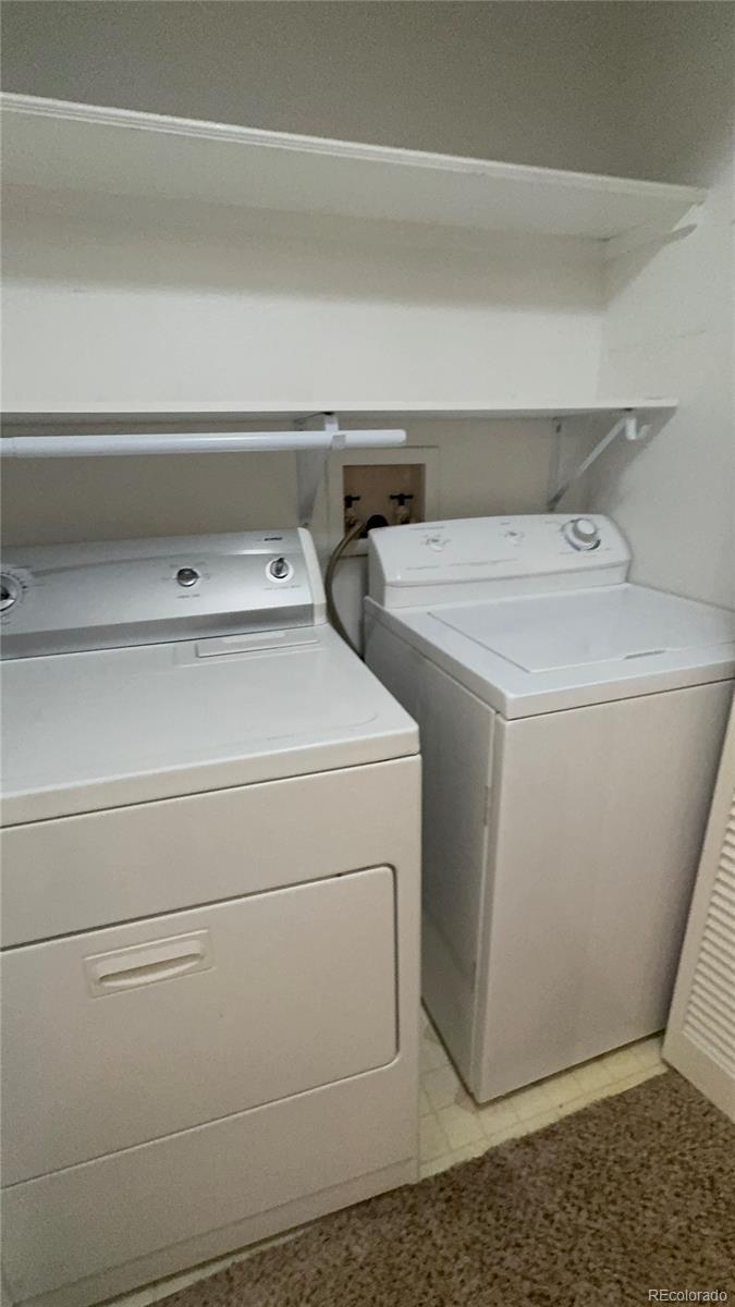 1815 Spaulding Circle Superior, CO 80027 - Photo 14 of 24 a utility room with dryer and washer