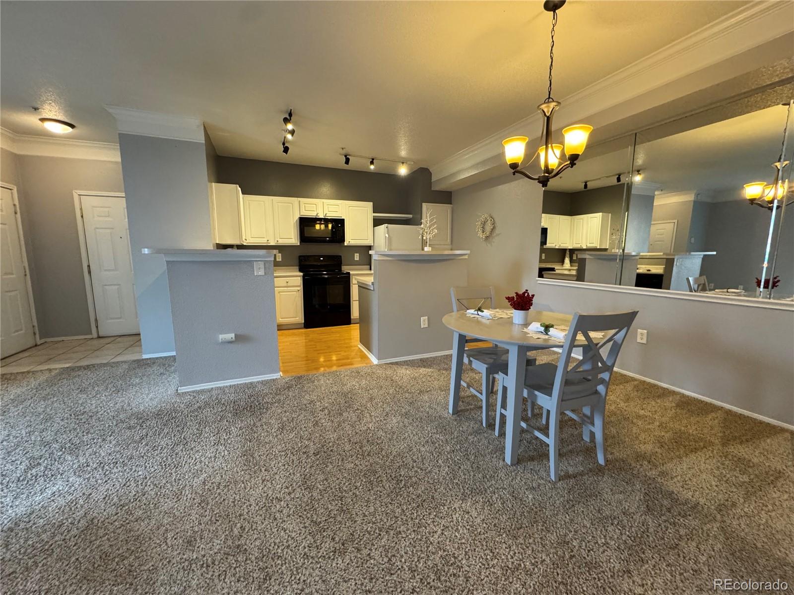 1815 Spaulding Circle Superior, CO 80027 - Photo 8 of 24 a view of a kitchen and dining room