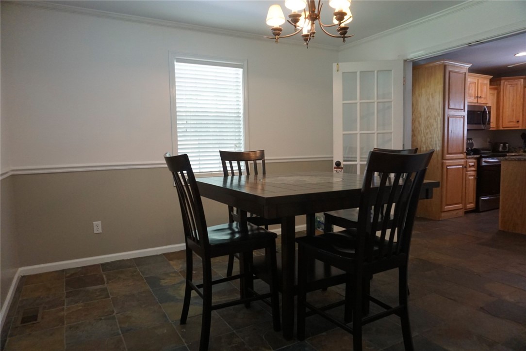 599 Mile Creek Road Pickens, SC 29671 - Photo 11 of 25 Dining room view into the kitchen