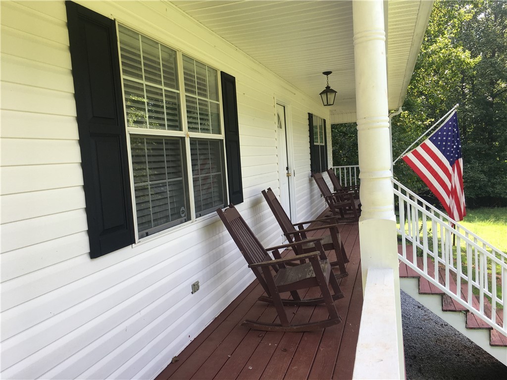 599 Mile Creek Road Pickens, SC 29671 - Photo 3 of 25 Enjoy sitting in your rocking chairs on the front