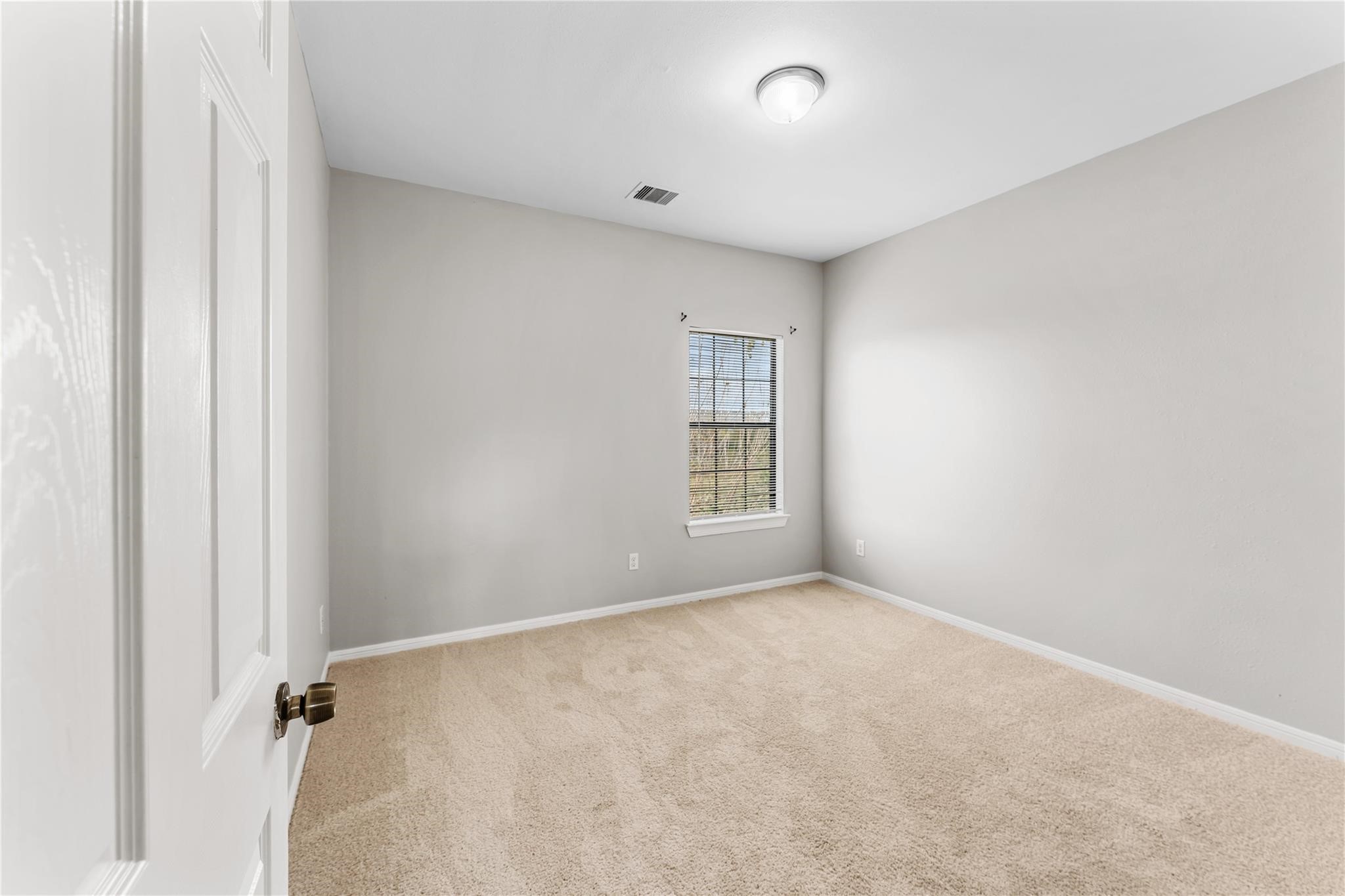 9610 Buffum Street, Unit B Houston, TX 77051 - Photo 24 of 25 an empty room with windows