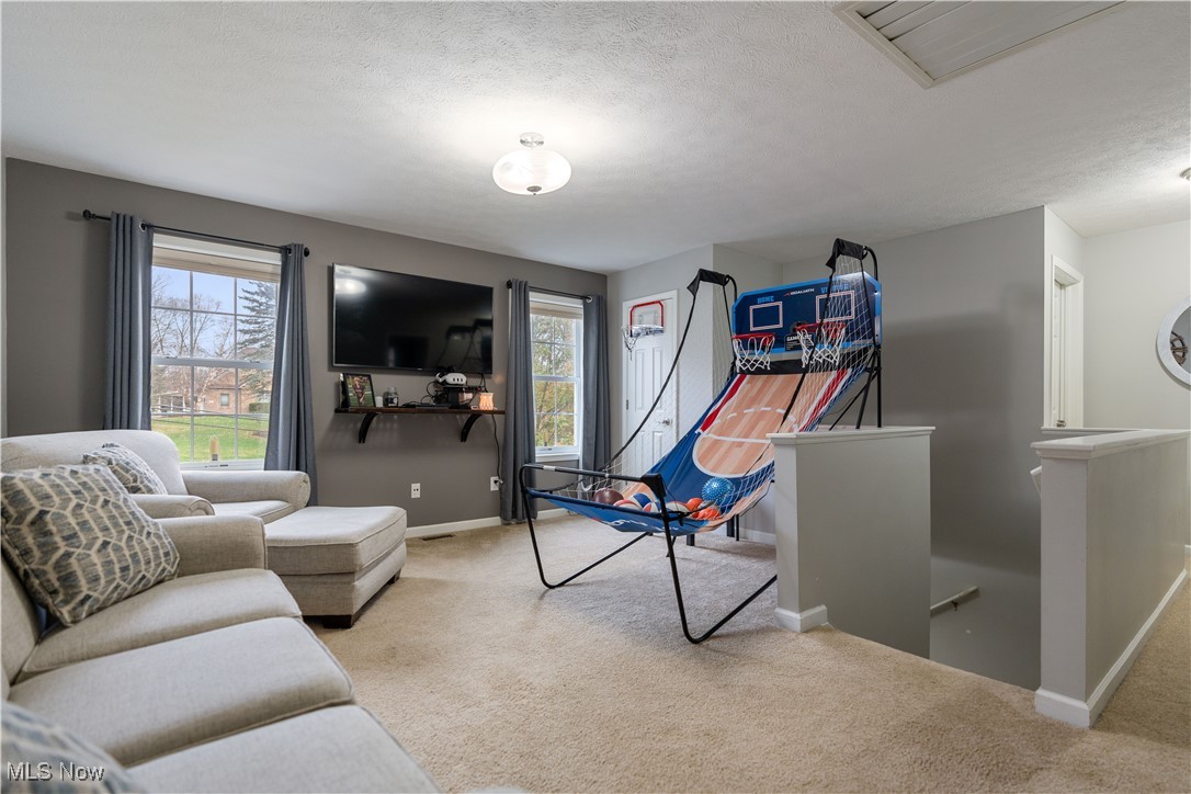2542 Call Road Stow, OH 44224 - Photo 38 of 47 Playroom featuring a textured ceiling and light carpet