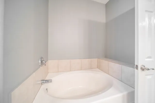 a bathroom with a bathtub