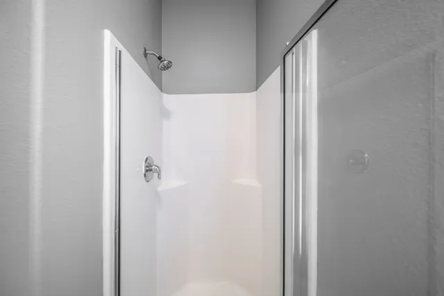 a view of a hallway with closet