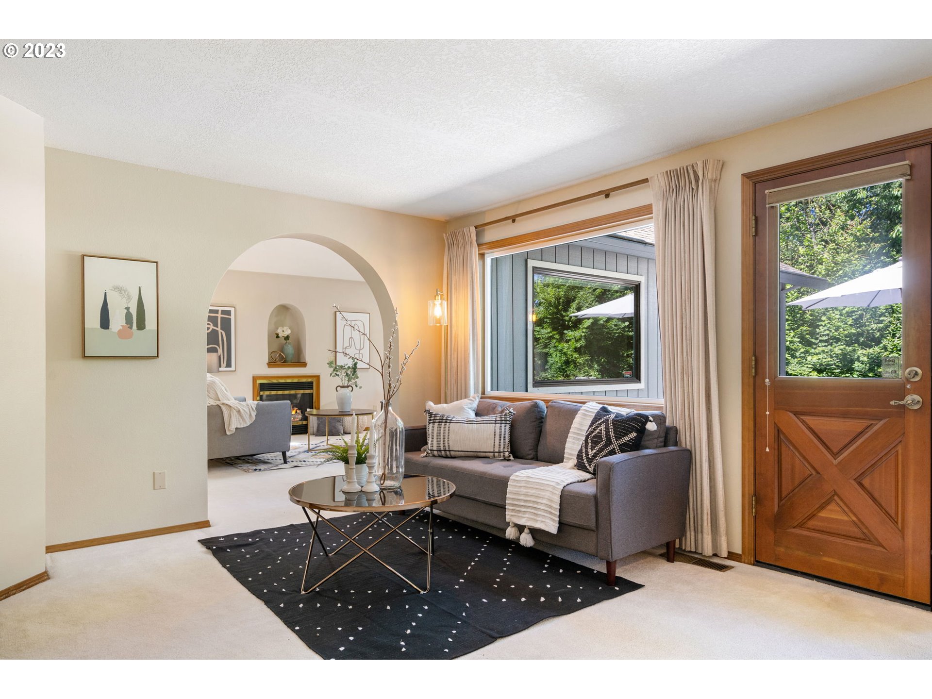 9062 Southwest Hill Street Portland, OR 97223 - Photo 14 of 48 a living room with furniture and a window