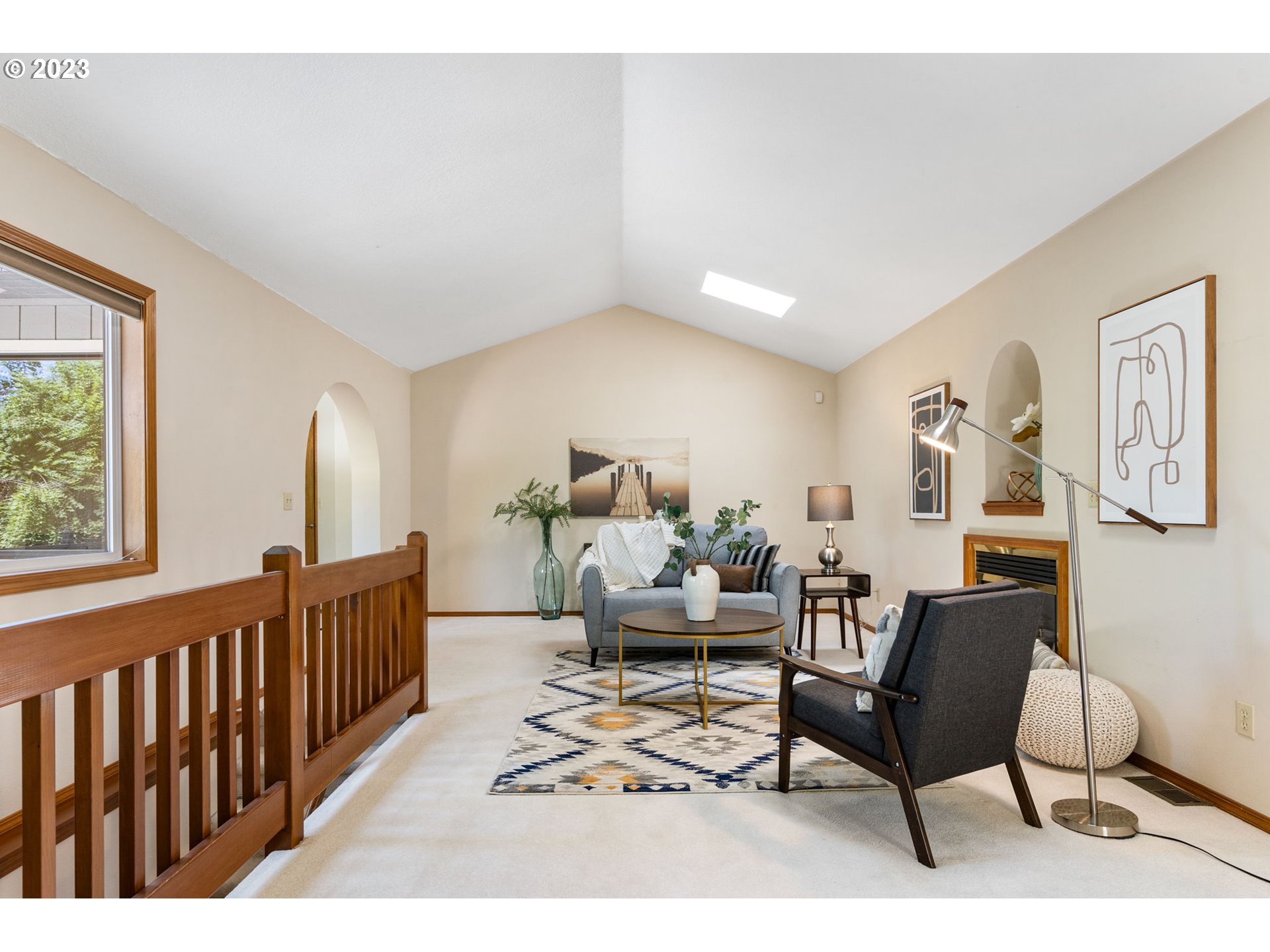 9062 Southwest Hill Street Portland, OR 97223 - Photo 15 of 48 a living room with furniture and a window