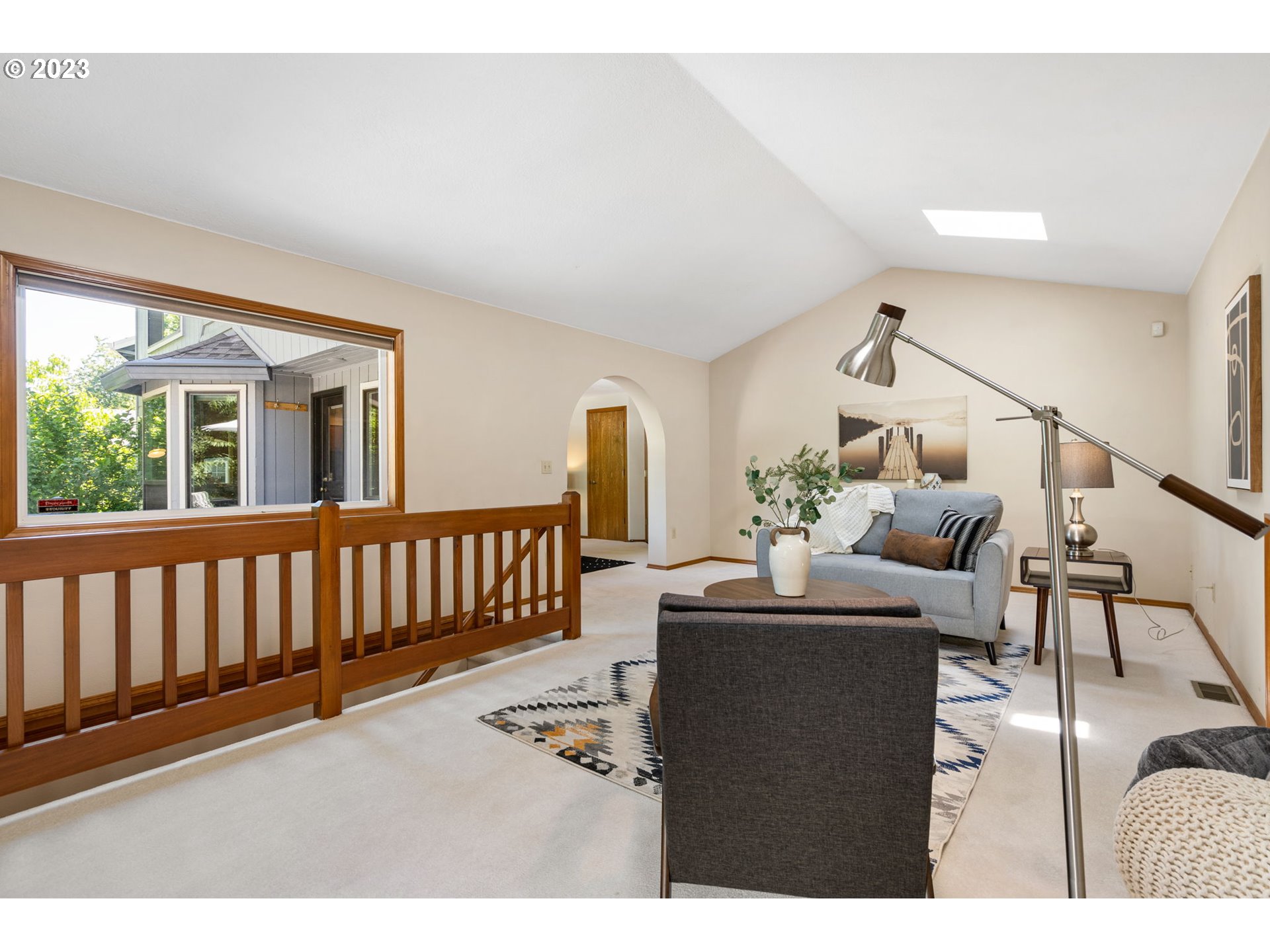 9062 Southwest Hill Street Portland, OR 97223 - Photo 16 of 48 a living room with furniture and wooden floor