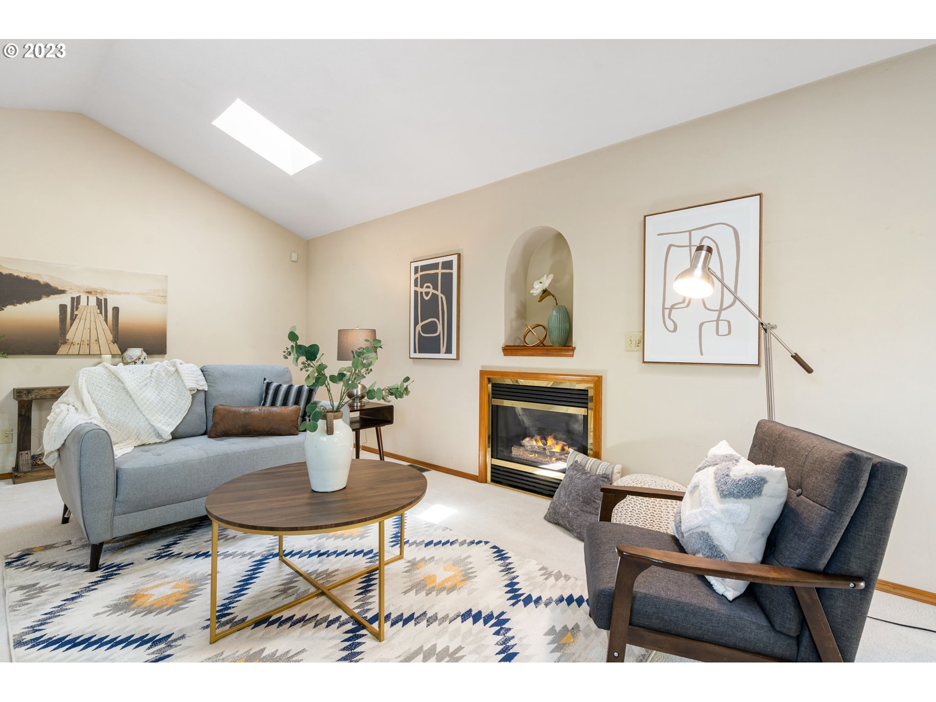 9062 Southwest Hill Street Portland, OR 97223 - Photo 17 of 48 a living room with furniture and a fireplace