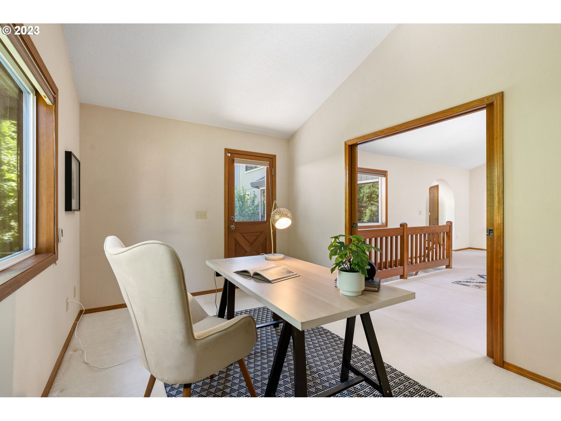 9062 Southwest Hill Street Portland, OR 97223 - Photo 20 of 48 a view of a dining room with furniture and a potted plant