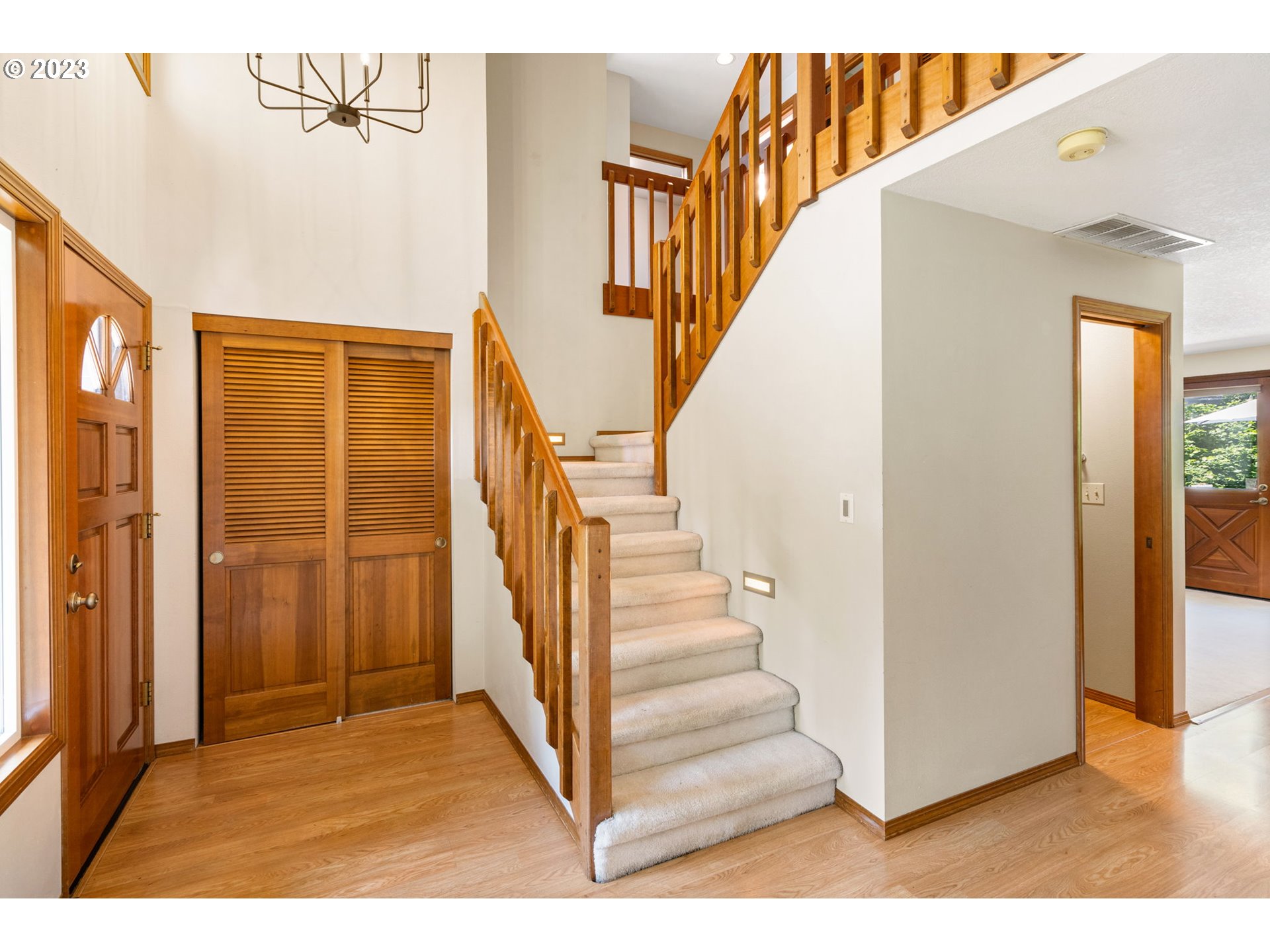 9062 Southwest Hill Street Portland, OR 97223 - Photo 22 of 48 a view of a hallway with staircase