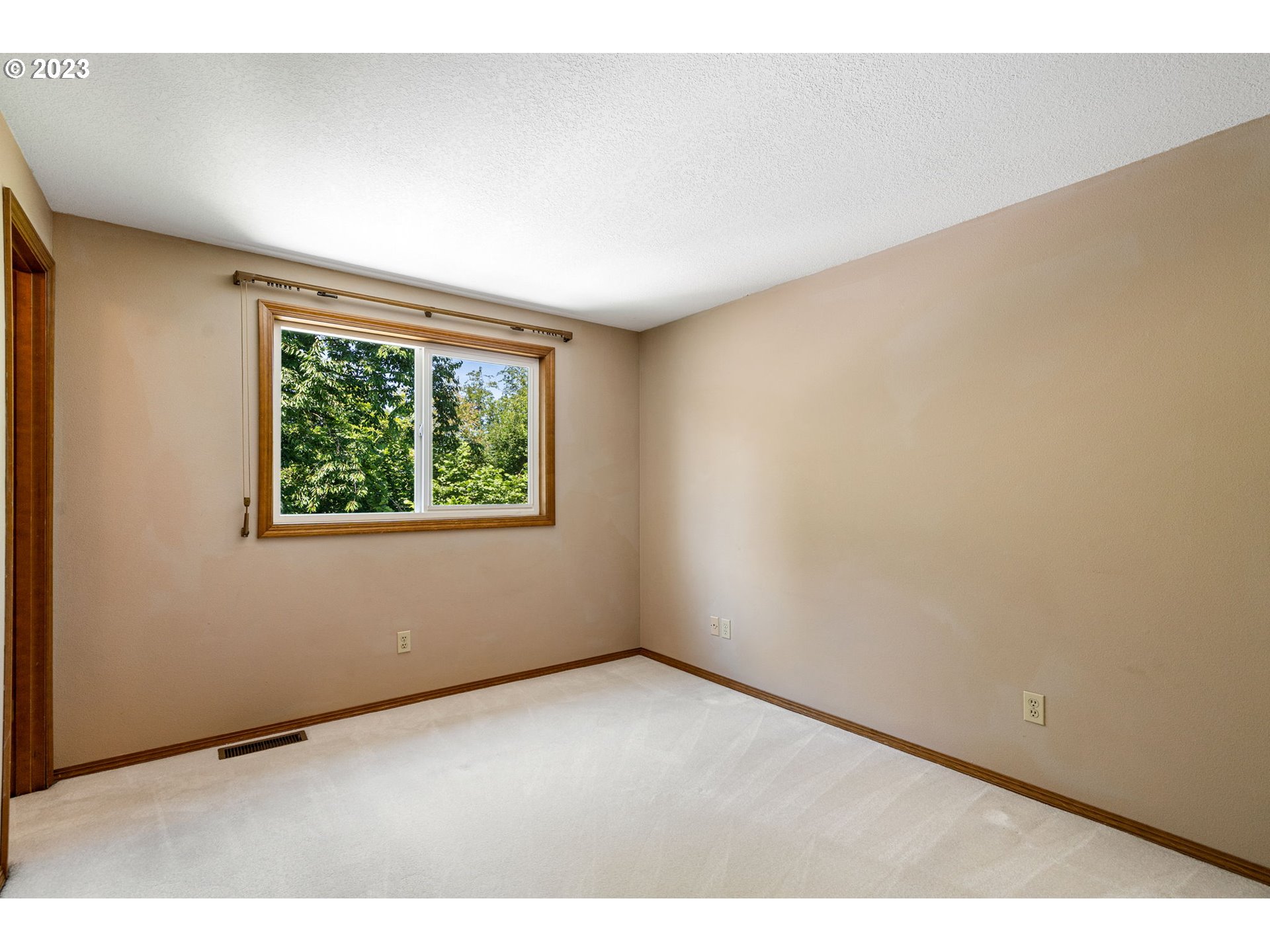 9062 Southwest Hill Street Portland, OR 97223 - Photo 32 of 48 an empty room with windows