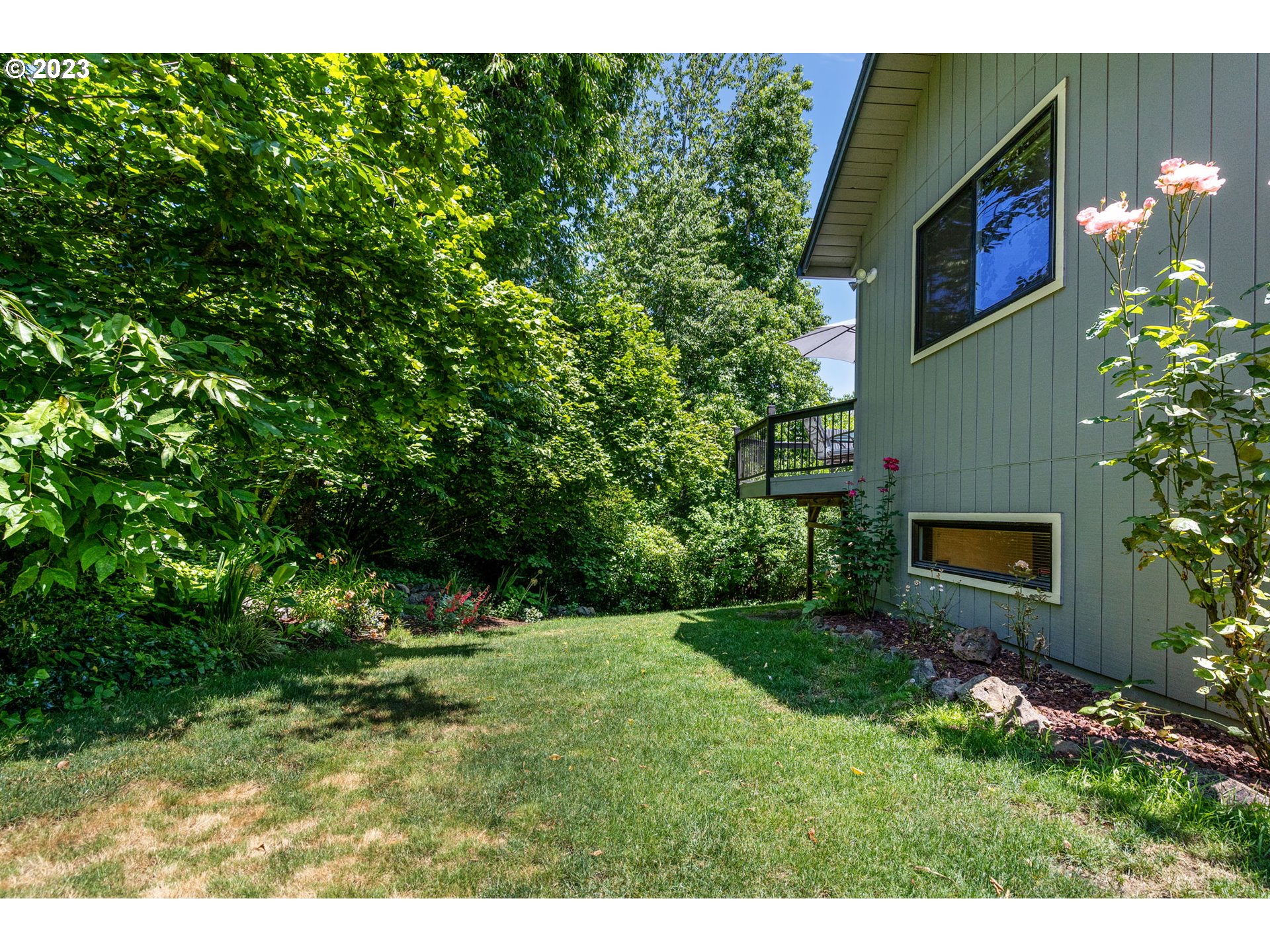 9062 Southwest Hill Street Portland, OR 97223 - Photo 42 of 48 a view of a back yard