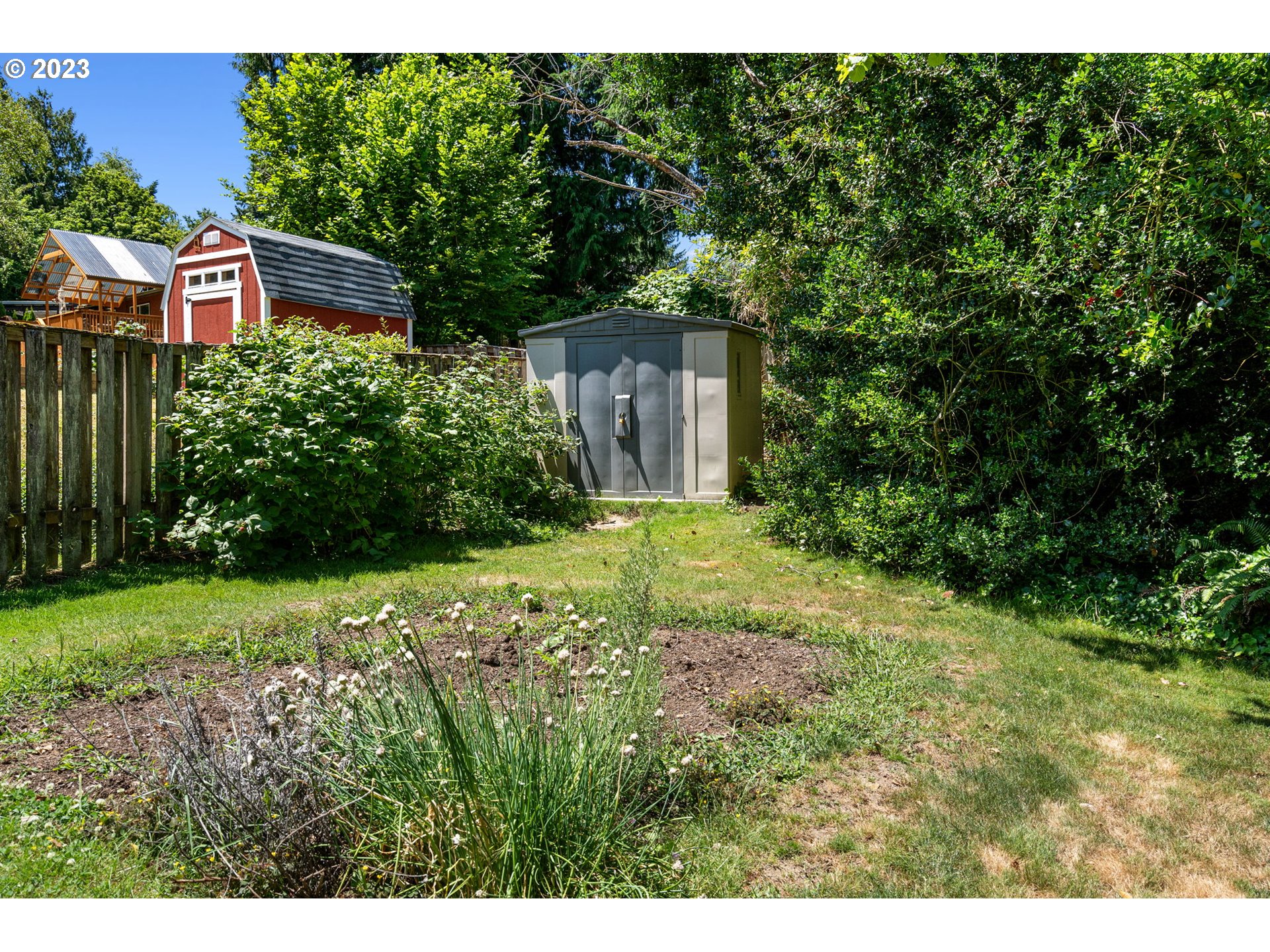 9062 Southwest Hill Street Portland, OR 97223 - Photo 44 of 48 a view of a back yard