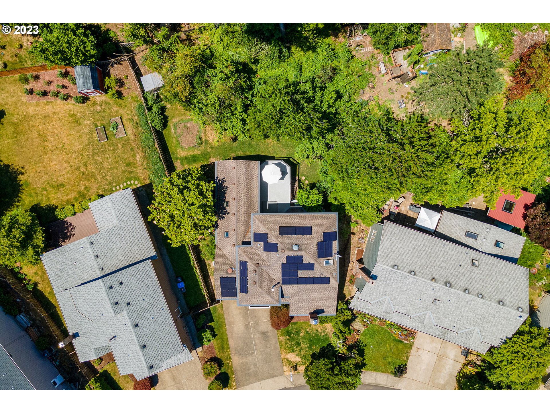 9062 Southwest Hill Street Portland, OR 97223 - Photo 45 of 48 an aerial view of a house with a yard swimming pool