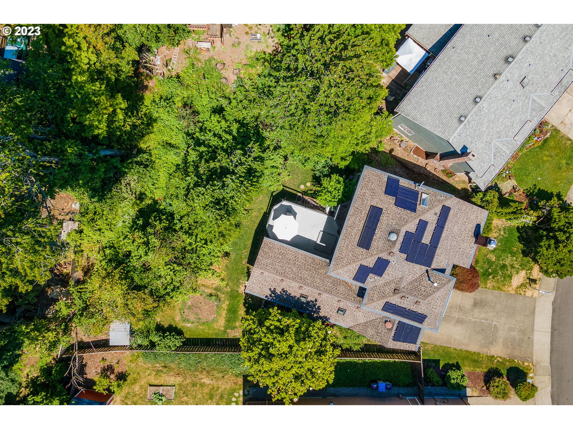 9062 Southwest Hill Street Portland, OR 97223 - Photo 46 of 48 an aerial view of a house with garden space and street view