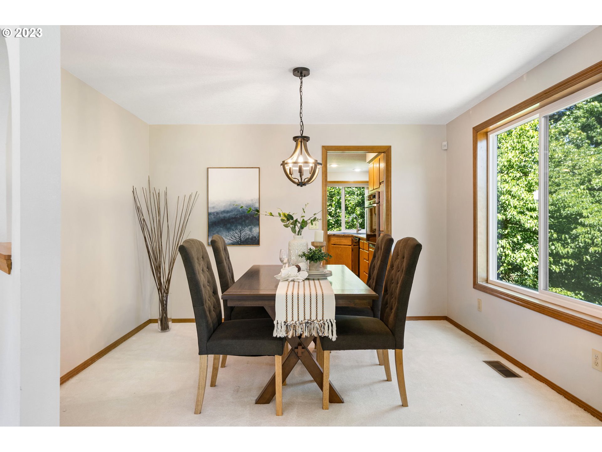 9062 Southwest Hill Street Portland, OR 97223 - Photo 8 of 48 a dining room with furniture window wooden floor