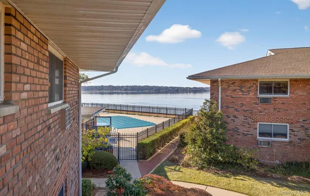 front view of a house with a garden