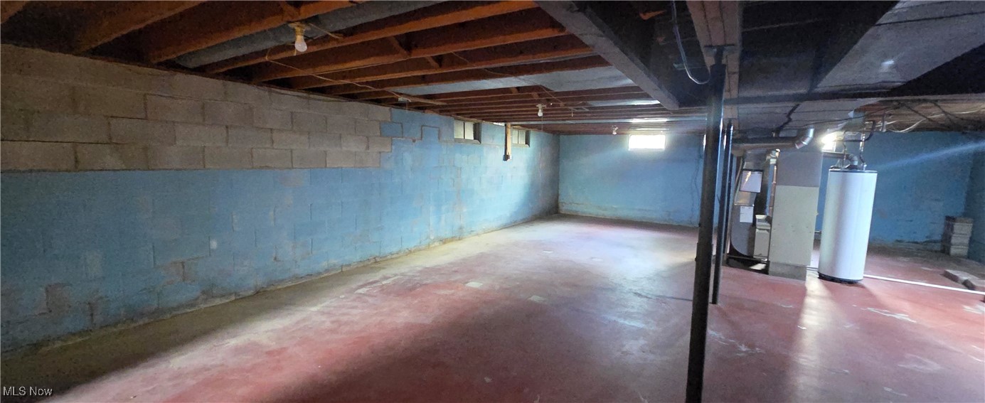 321 Magnolia Road Huron, OH 44839 - Photo 20 of 23 Basement with gas water heater and heating unit