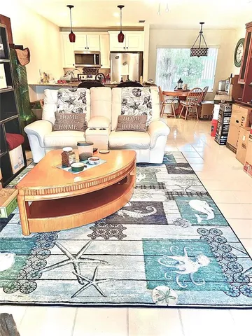 a outdoor space with a table and chairs