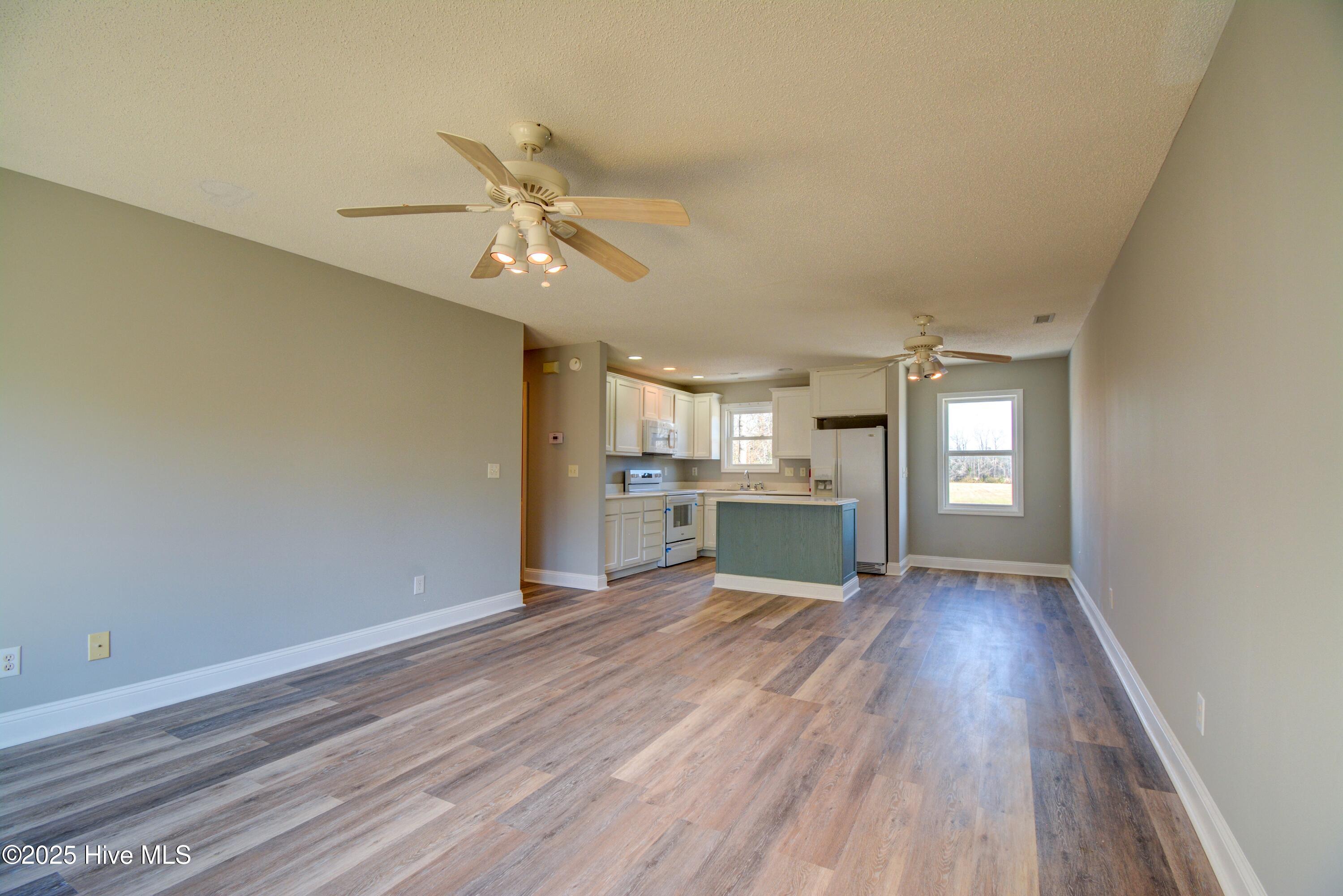 320 Belt Road Hampstead, NC 28443 - Photo 21 of 38 Main level dining and kitchen area