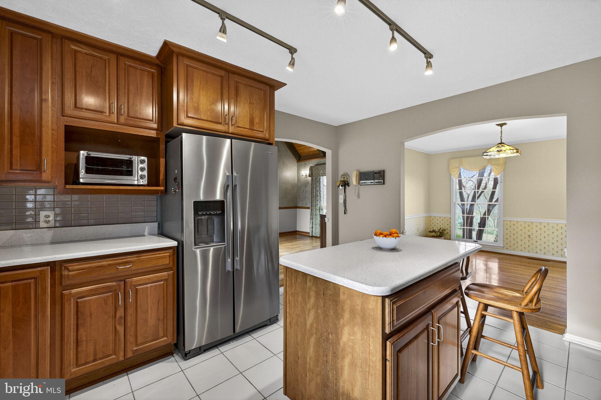 456 Marple Road Winchester, VA 22603 - Photo 26 of 84 Island provides additional seating & counter space