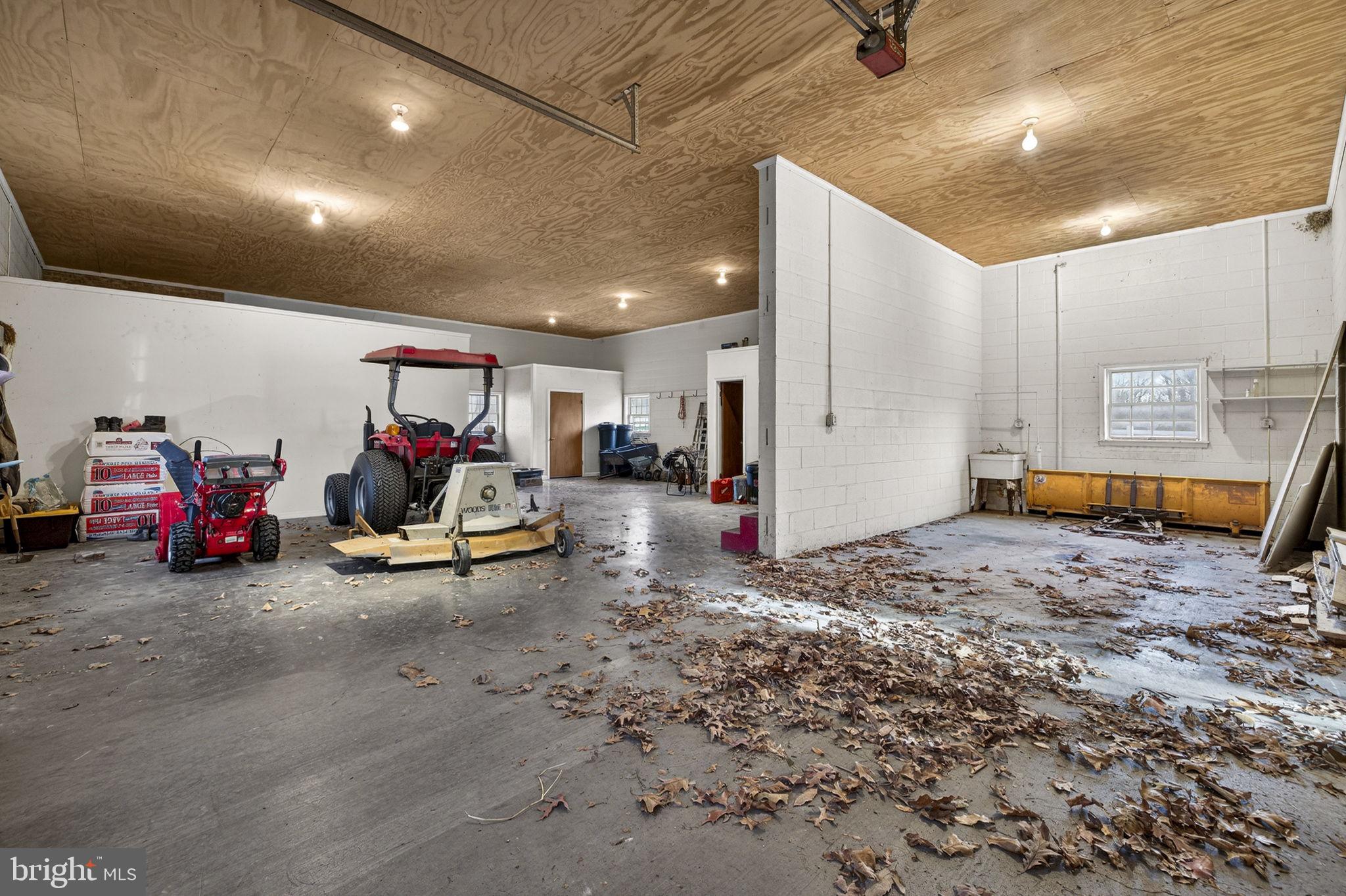 456 Marple Road Winchester, VA 22603 - Photo 65 of 84 Interior of the barn w/ equipment & workshop area
