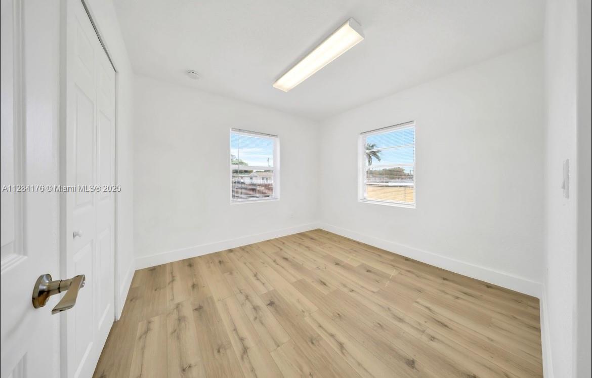 782 East 37th Street Hialeah, FL 33013 - Photo 14 of 46 an empty room with windows