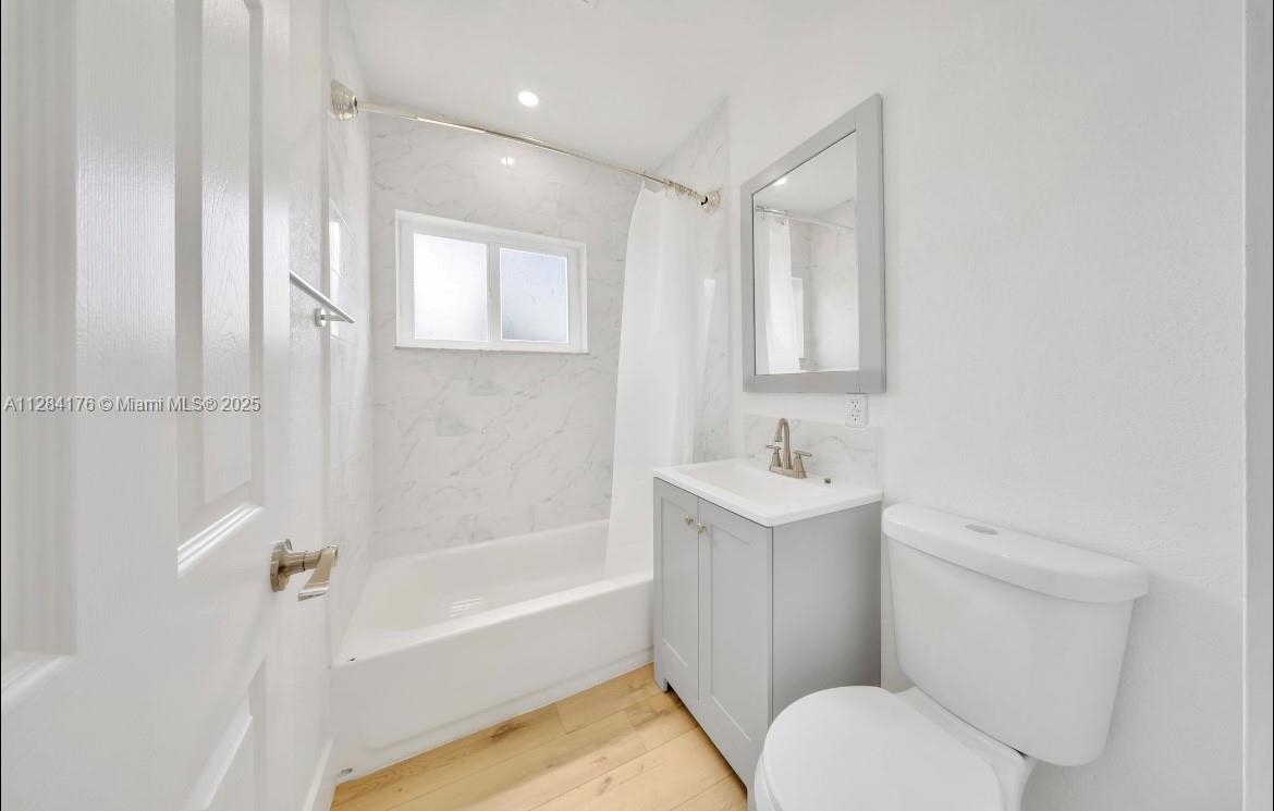 782 East 37th Street Hialeah, FL 33013 - Photo 17 of 46 a bathroom with a sink toilet and shower