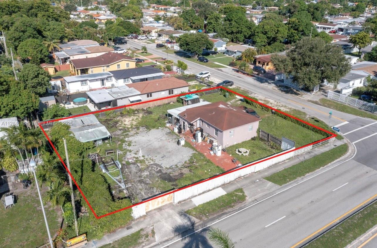 782 East 37th Street Hialeah, FL 33013 - Photo 24 of 46 an aerial view of residential houses with outdoor space