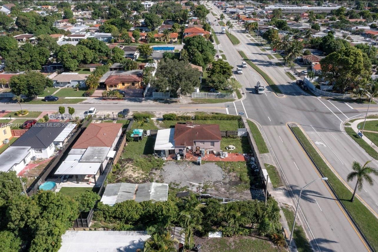 782 East 37th Street Hialeah, FL 33013 - Photo 29 of 46 an aerial view of residential houses with outdoor space