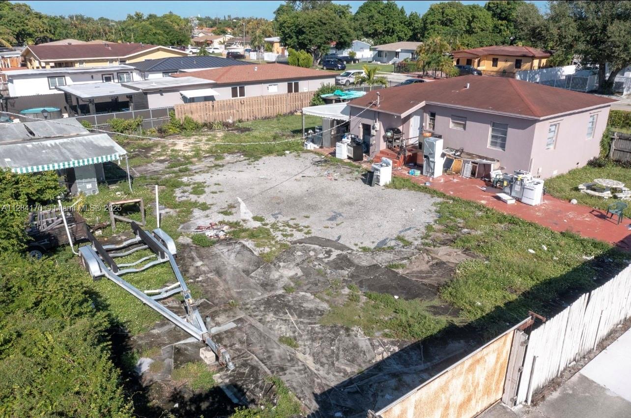 782 East 37th Street Hialeah, FL 33013 - Photo 31 of 46 an aerial view of residential houses with outdoor space