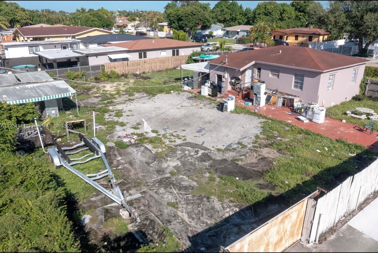 782 East 37th Street Hialeah, FL 33013 - Photo 32 of 46 an aerial view of residential houses with outdoor space