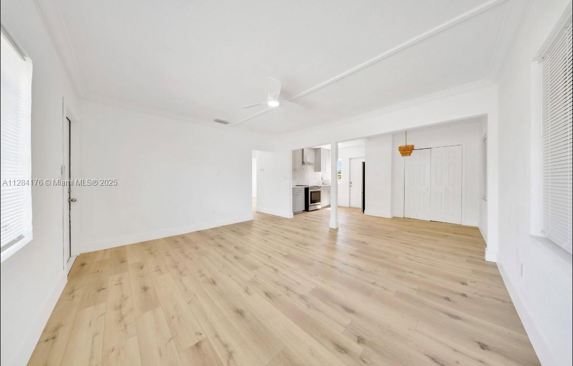 782 East 37th Street Hialeah, FL 33013 - Photo 7 of 46 a view of empty room with wooden floor