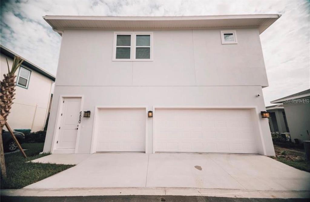 6824 Bridgman Street Orlando, FL 32827 - Photo 1 of 19 a view of a storage & utility room