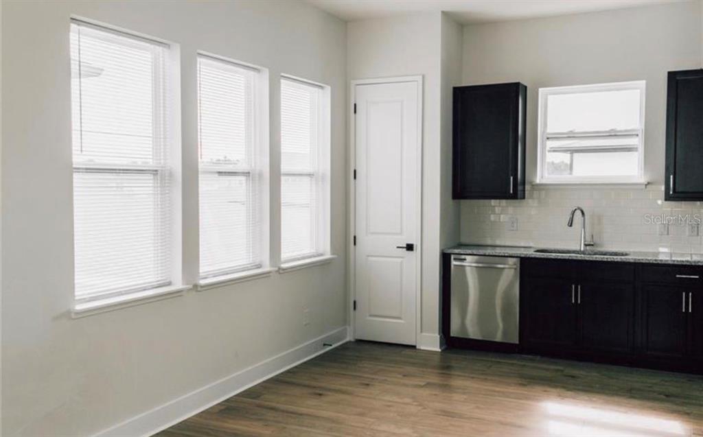 6824 Bridgman Street Orlando, FL 32827 - Photo 5 of 19 a view of cabinets and window