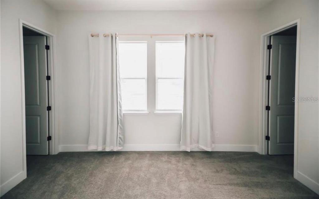 6824 Bridgman Street Orlando, FL 32827 - Photo 9 of 19 an empty room with window