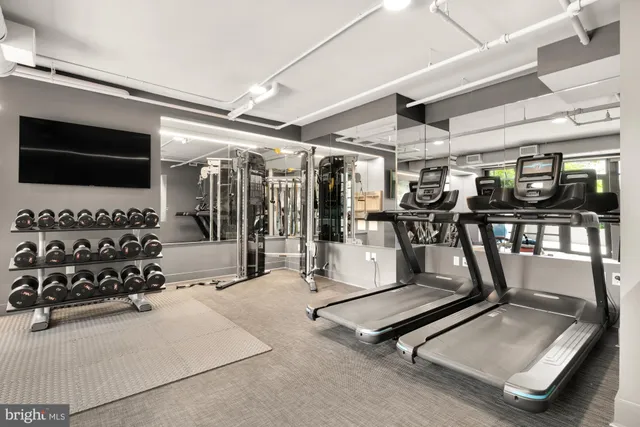 a gym room with gym equipment