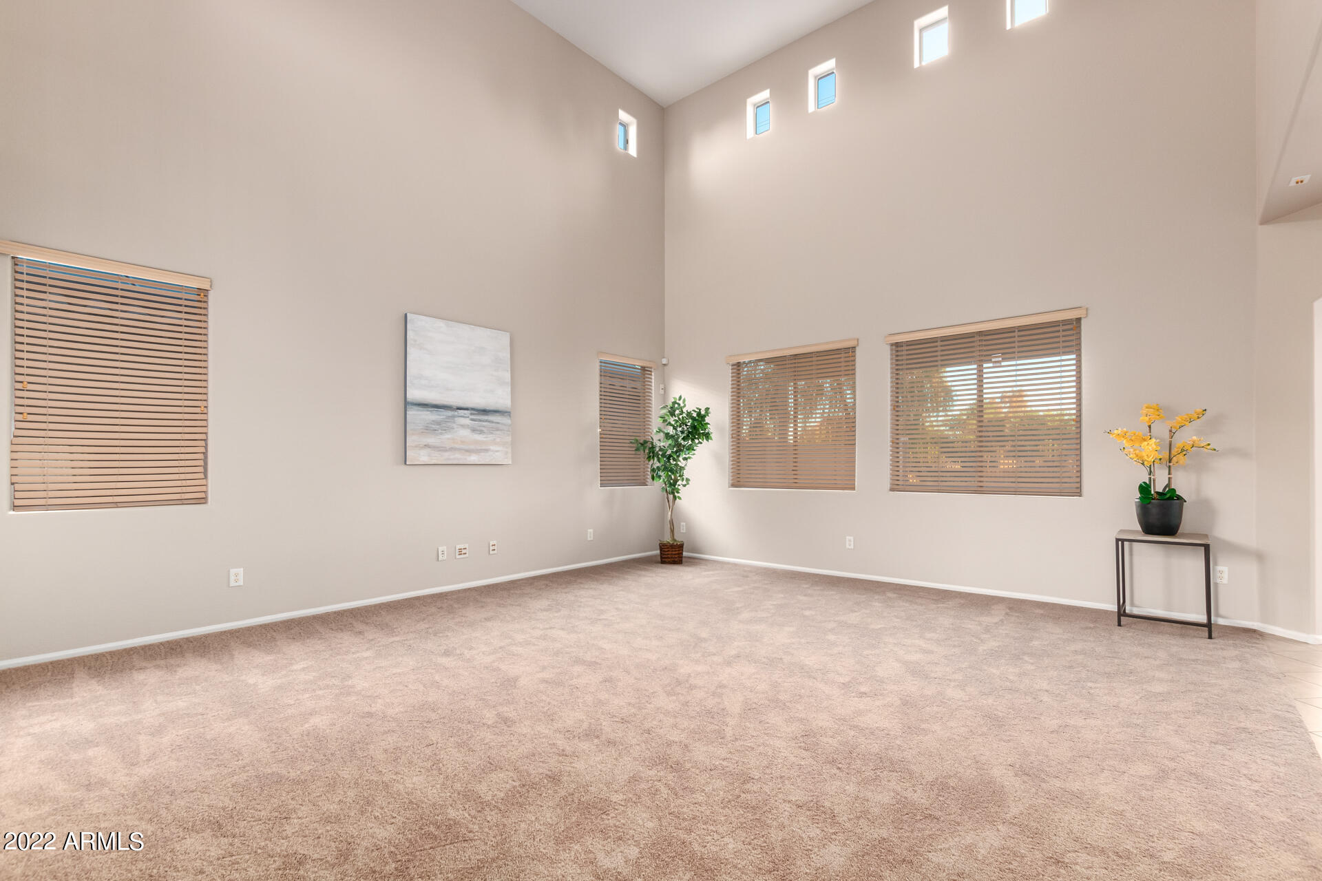 9123 West Heber Road Tolleson, AZ 85353 - Photo 14 of 41 a view of an empty room with a window