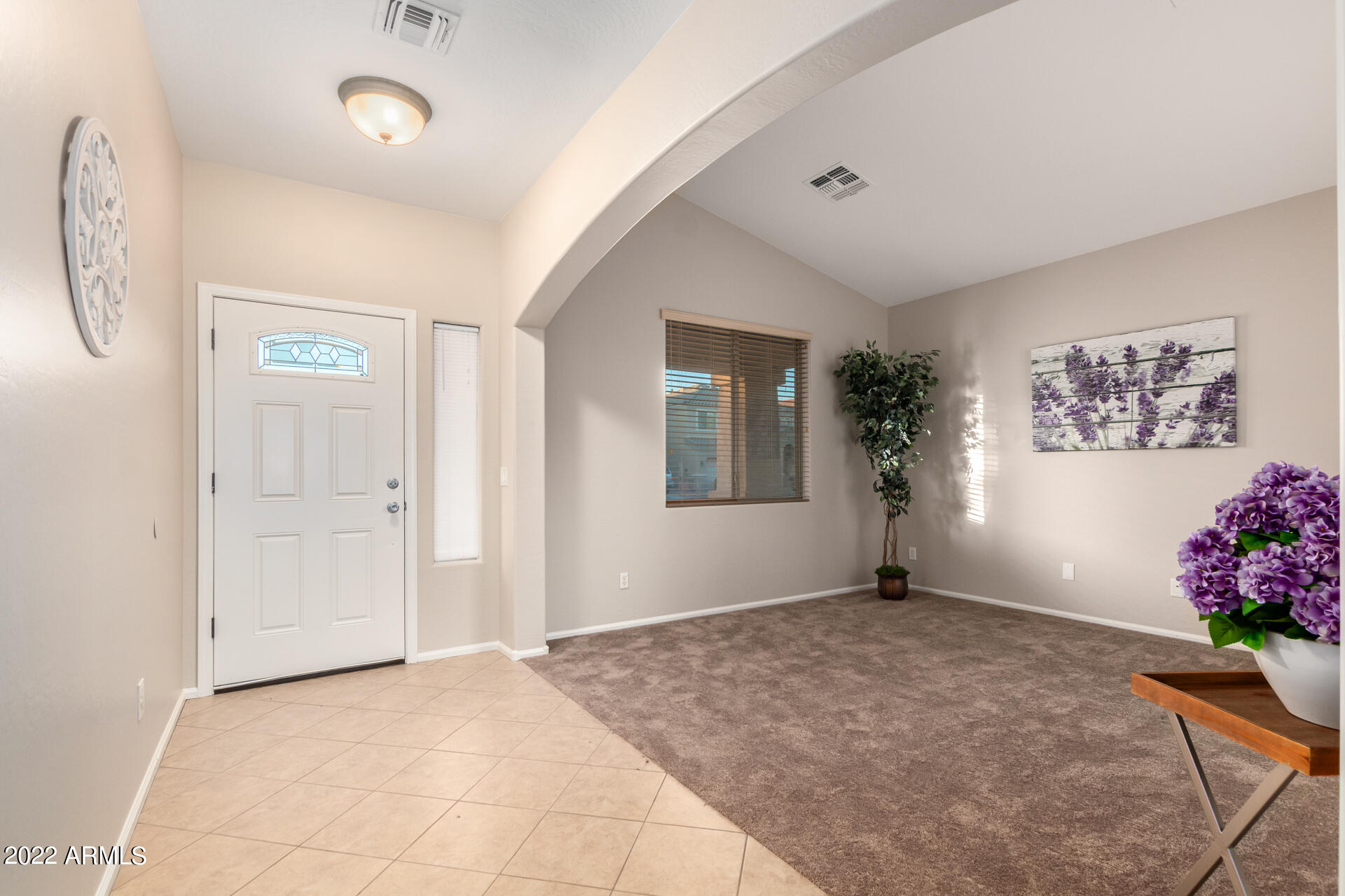 9123 West Heber Road Tolleson, AZ 85353 - Photo 3 of 41 a view of an empty room with a window