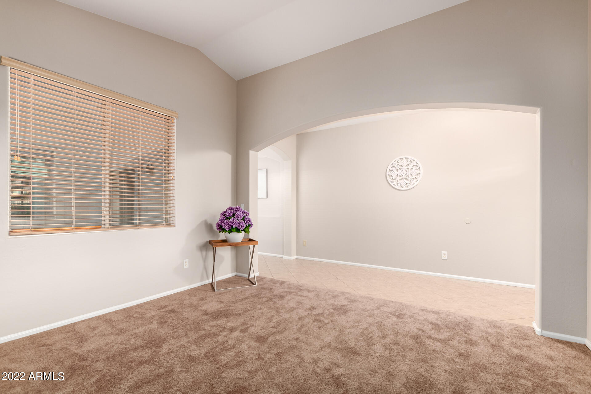 9123 West Heber Road Tolleson, AZ 85353 - Photo 4 of 41 a view of an empty room with a window