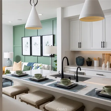 a kitchen with a sink cabinets and appliances