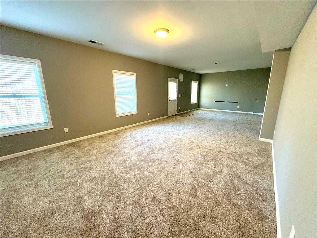 248 Webster Lake Drive Temple, GA 30179 - Photo 22 of 29 an empty room with windows