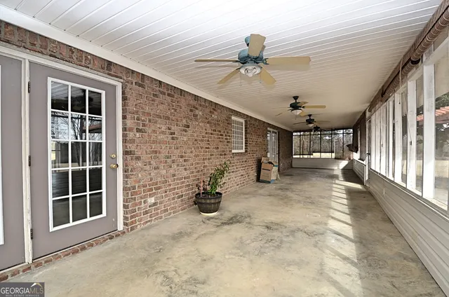 a view of a porch with seating space