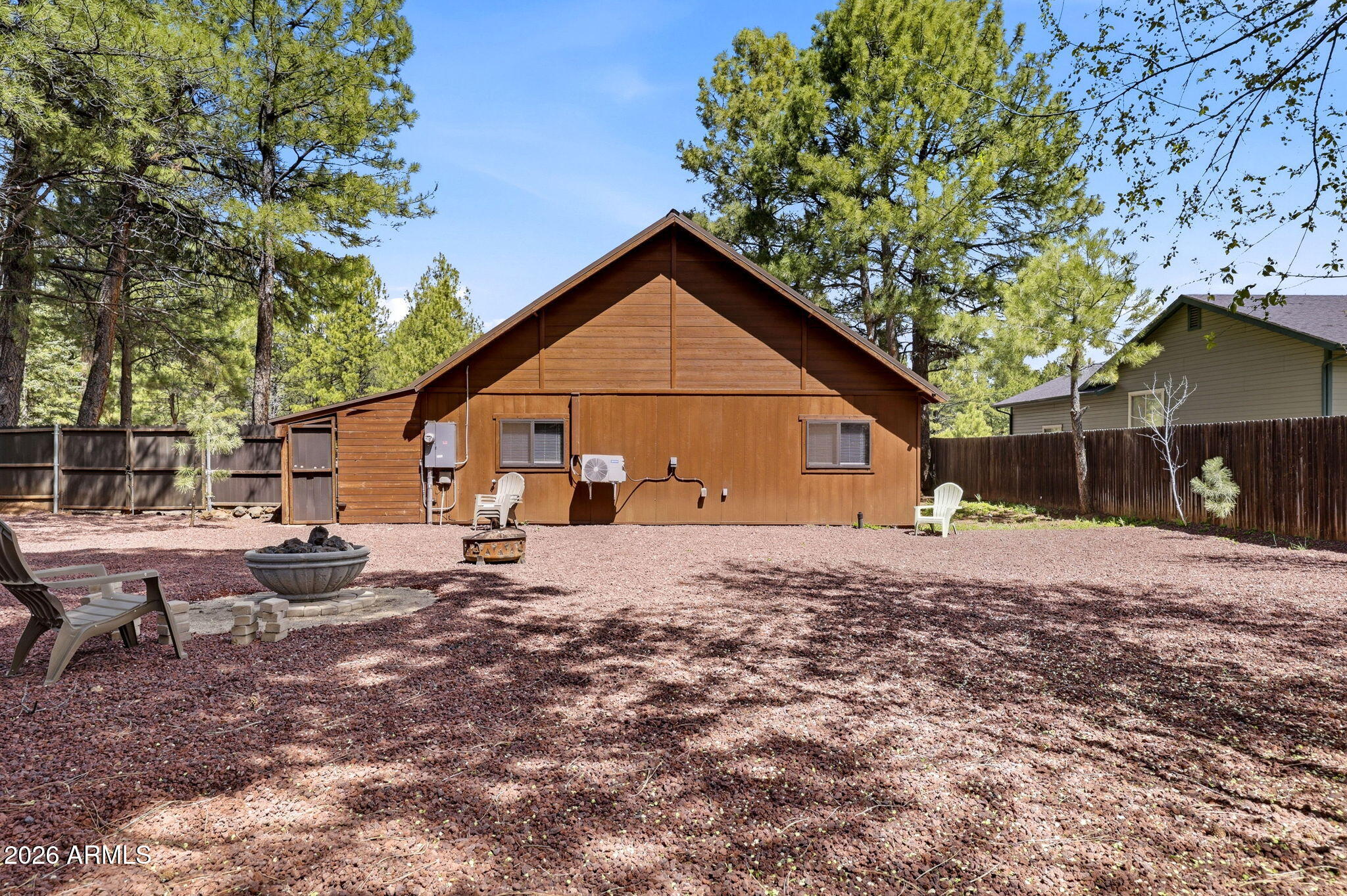 4971 Buck Springs Road Pinetop, AZ 85935 - Photo 26 of 32 a view of a house with a yard and a tree