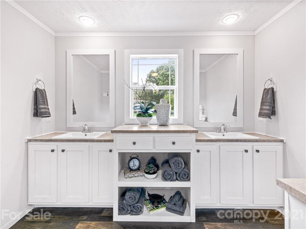 14 Souther Road Fletcher, NC 28732 - Photo 17 of 25 a bathroom with a sink and a mirror