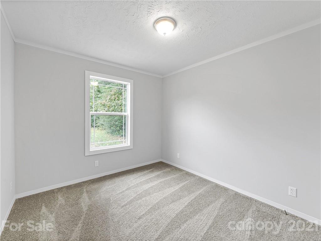 14 Souther Road Fletcher, NC 28732 - Photo 21 of 25 an empty room with a window